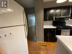 View of hallway leading to bedrooms and bath. -