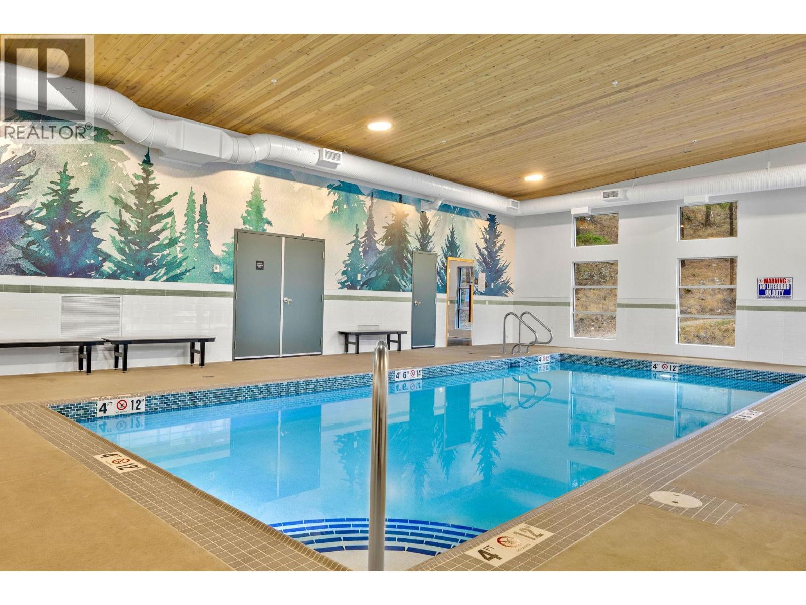 3475 Granite Close Unit# 401, Kelowna, BC - Indoor Photo Showing Other Room With In Ground Pool