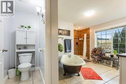 Exposed primary ensuite with a free standing tub -