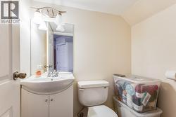 Lower level half bathroom -