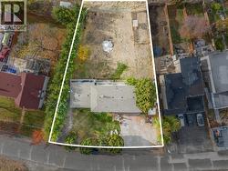 Large, usable lot with drive through access from the front of the property -