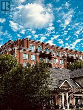 332 - 21 Burkebrook Place, Toronto, ON - Outdoor With Facade