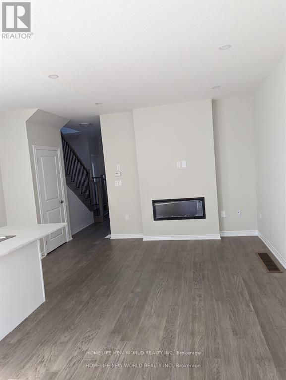 18 - 30 Mia Drive, Hamilton, ON - Indoor With Fireplace