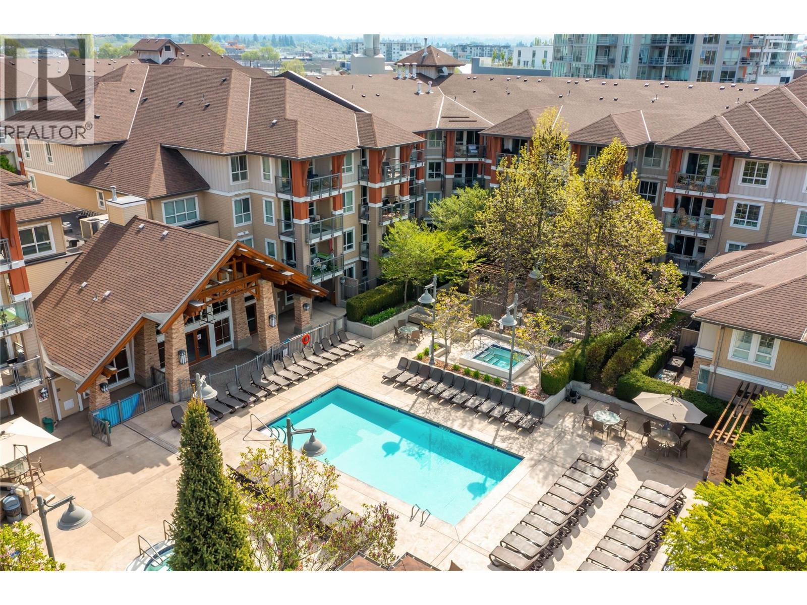 1075 Sunset Drive Unit# 2107, Kelowna, BC - Outdoor With In Ground Pool