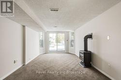 Family room with sliding door to front yard -
