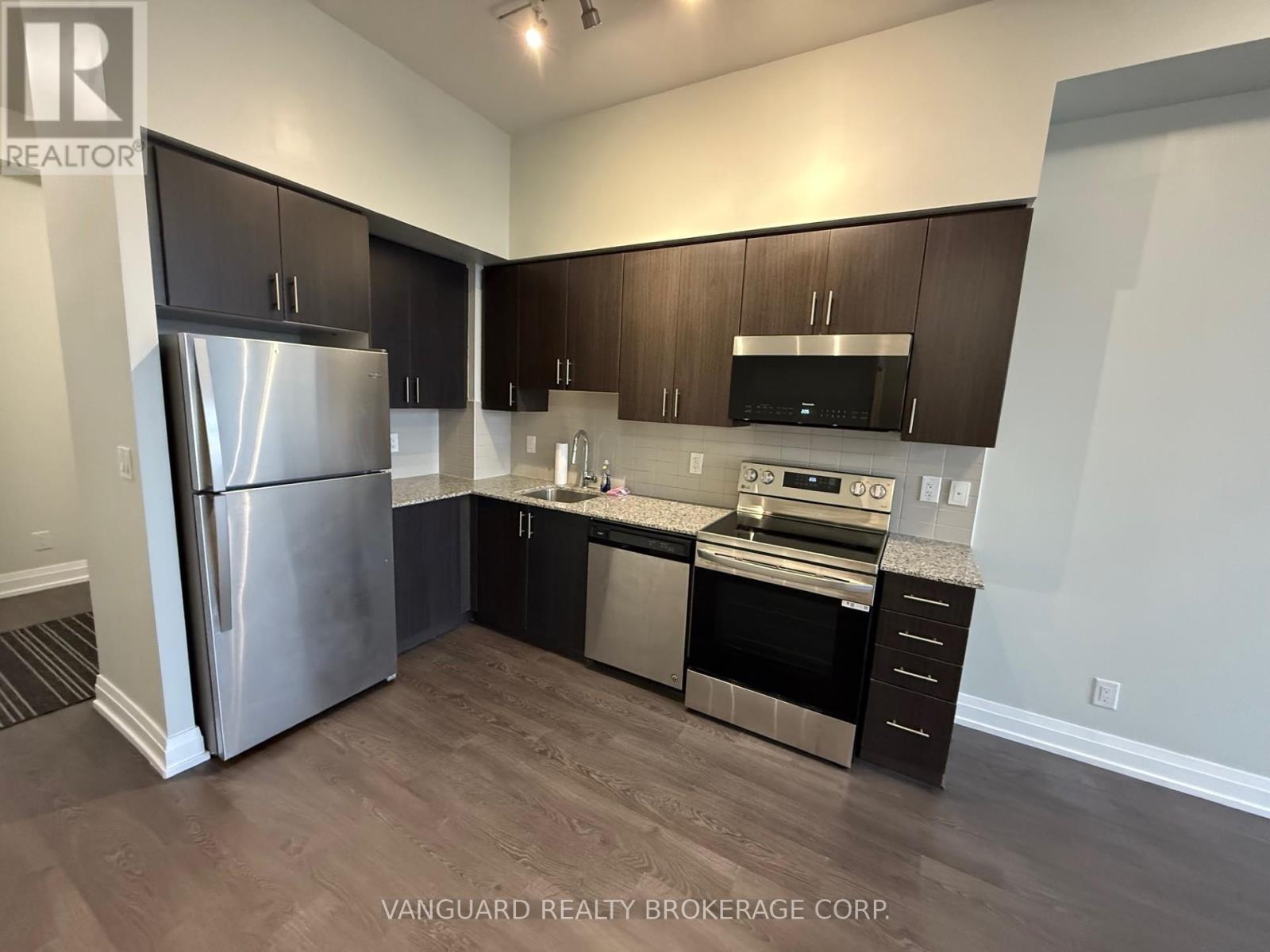316 - 3600 Highway 7, Vaughan, ON - Indoor Photo Showing Kitchen