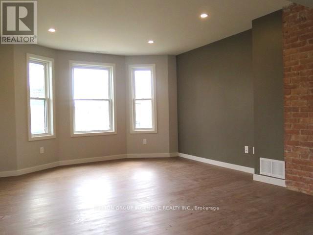 Living Room Area of Apartment - 18 Worsley Street, Barrie, ON