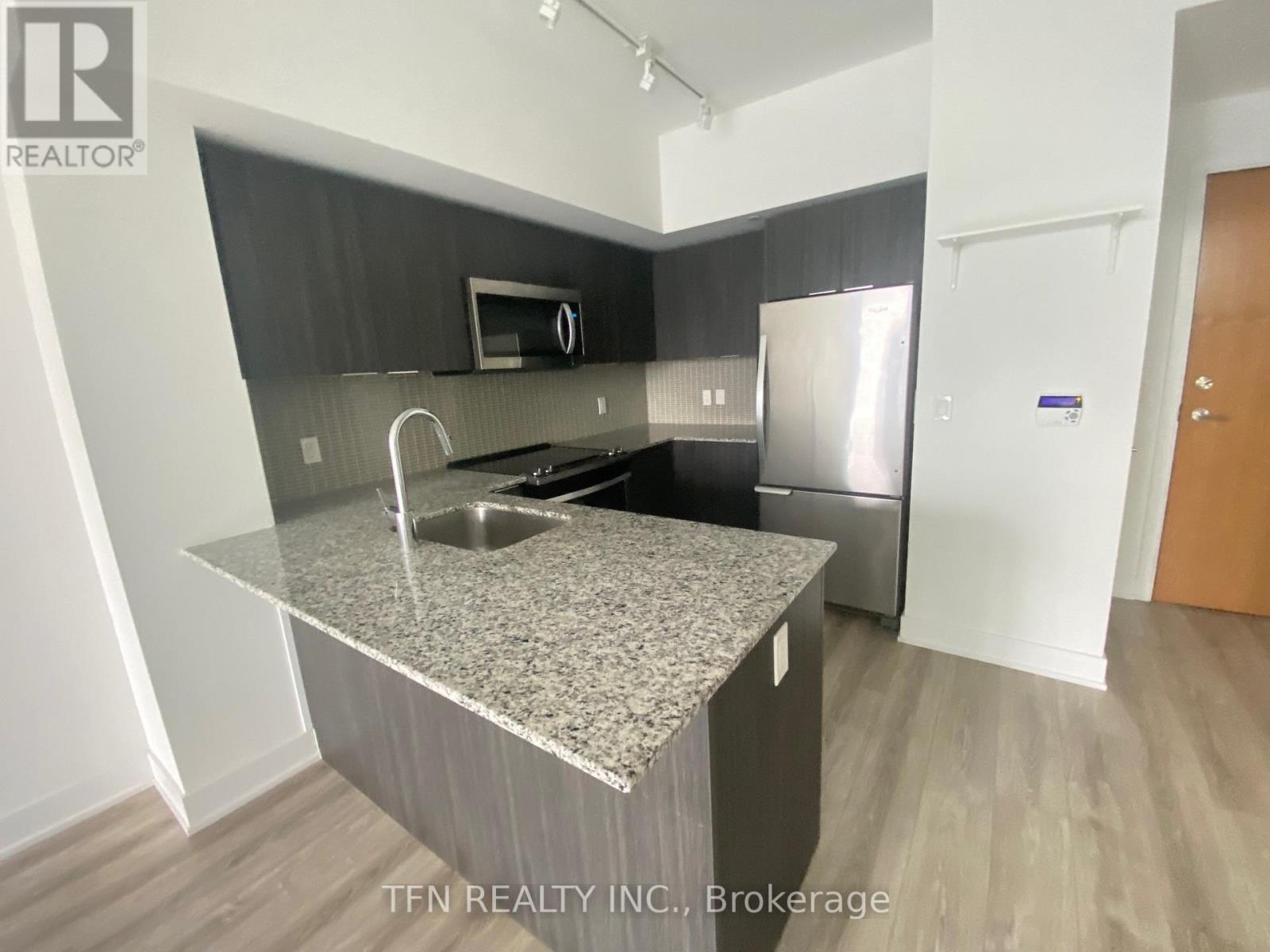 2305 - 20 Shore Breeze Drive, Toronto, ON - Indoor Photo Showing Kitchen With Double Sink