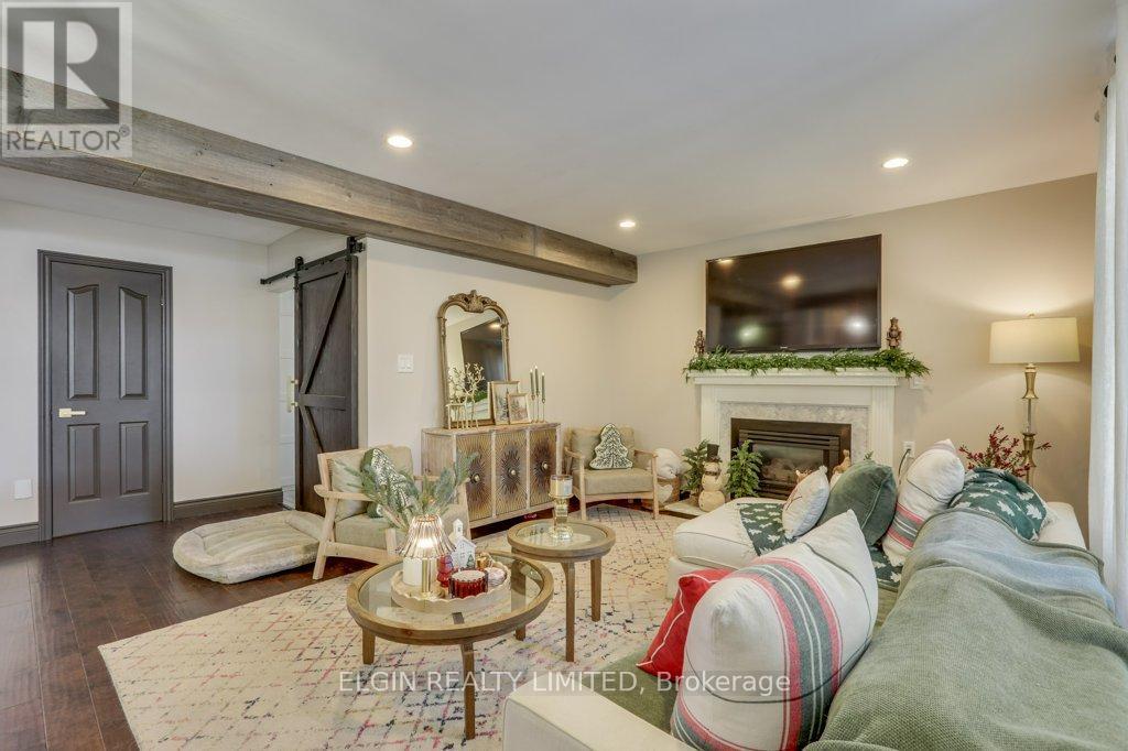28 Massey Drive, St. Thomas, ON - Indoor Photo Showing Living Room With Fireplace