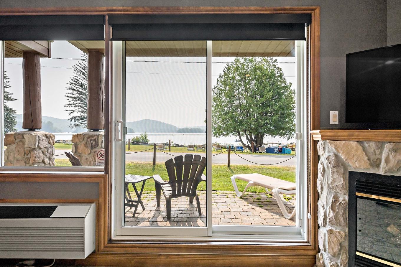 Patio - 20-2396 Rue Labelle, Mont-Tremblant, QC - Indoor With Fireplace