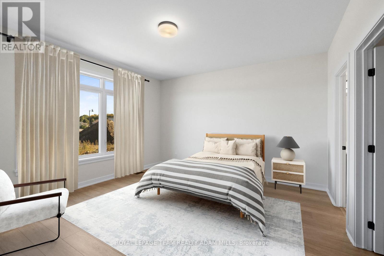 Virtually Staged Primary - 1047 Moore Street, Brockville, ON - Indoor Photo Showing Bedroom