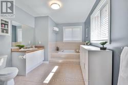 Primary ensuite with separate shower & soaker tub! -