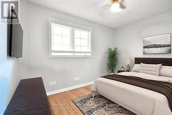 Virtually staged 2nd bedroom -