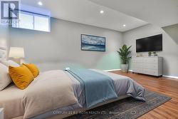Virtually Staged 5th bsmt Bedroom -