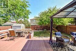 Fully fenced yard with mature trees & great deck! -