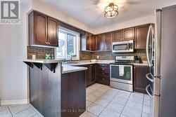 Open concept kitchen with lots of cabinetry! -