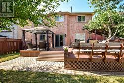 Walk out from kitchen to entertainer's deck! -