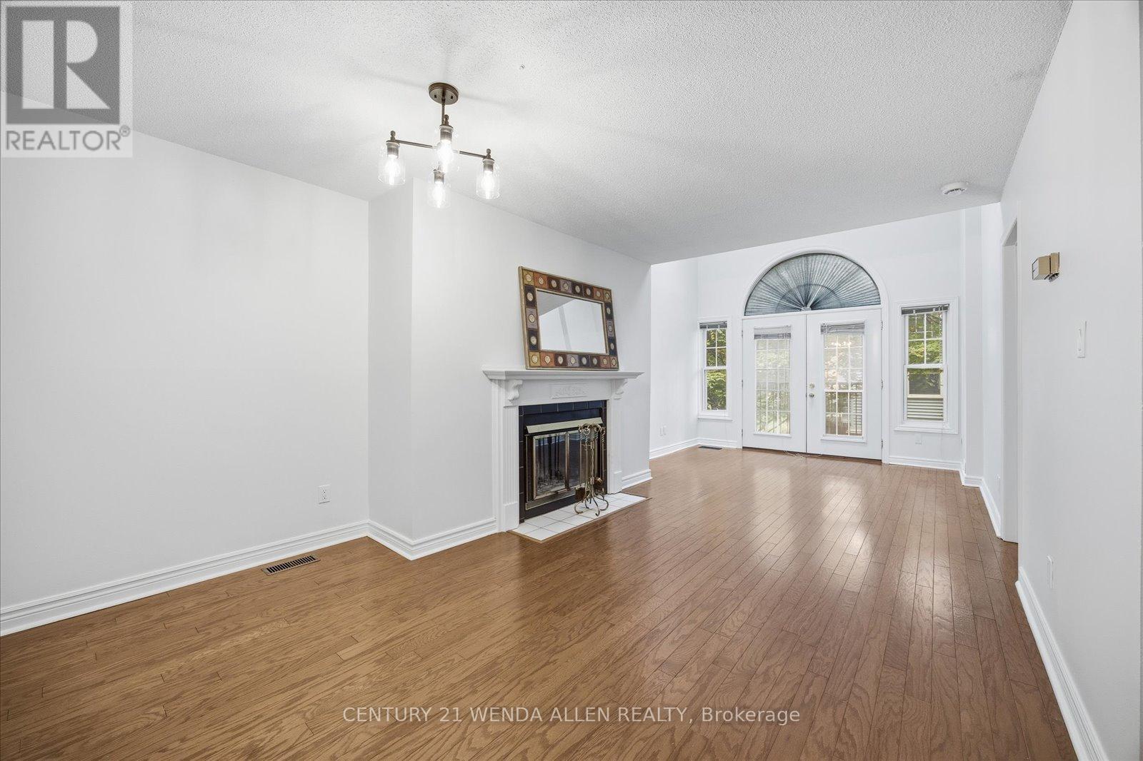 D16 - 1663 Nash Road, Clarington, ON - Indoor Photo Showing Living Room With Fireplace