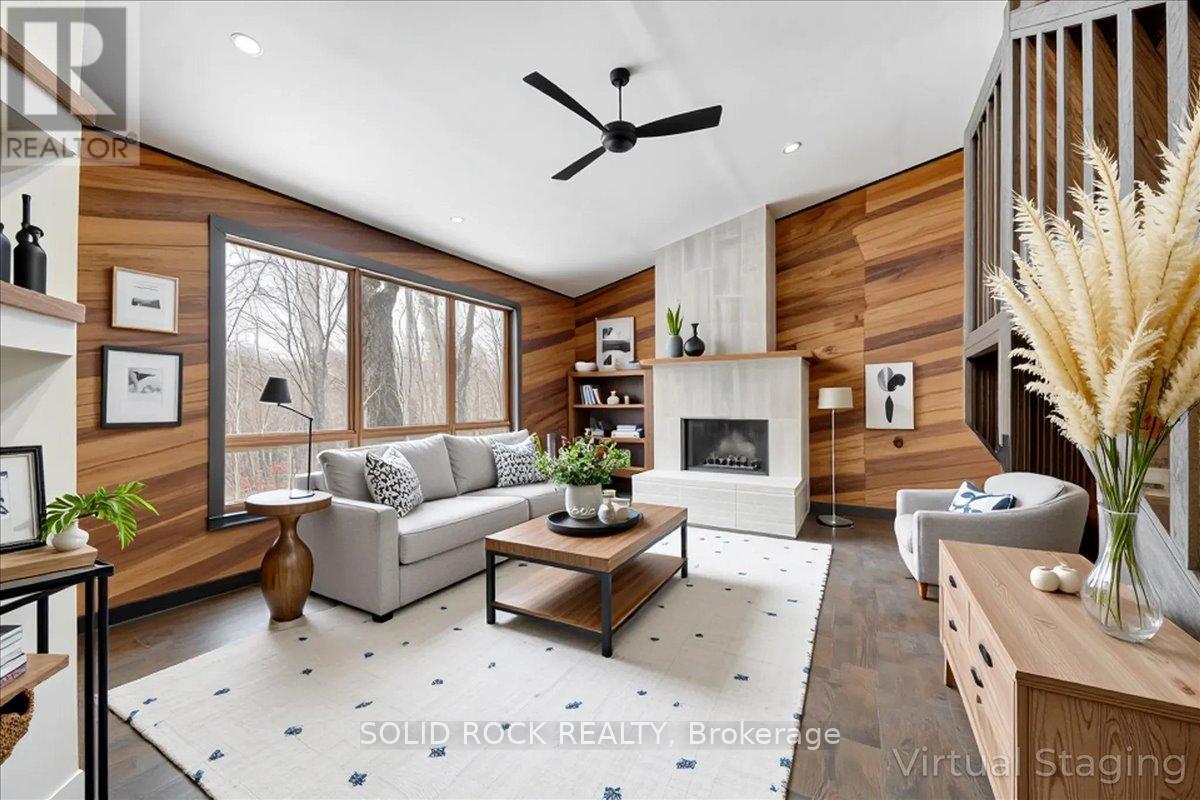 VIRTUALLY STAGED - 132 Beaver Creek Road, Marmora And Lake (Marmora Ward), ON - Indoor Photo Showing Living Room With Fireplace