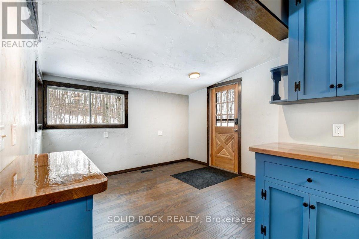 breakfast nook with door - 132 Beaver Creek Road, Marmora And Lake (Marmora Ward), ON - Indoor Photo Showing Other Room
