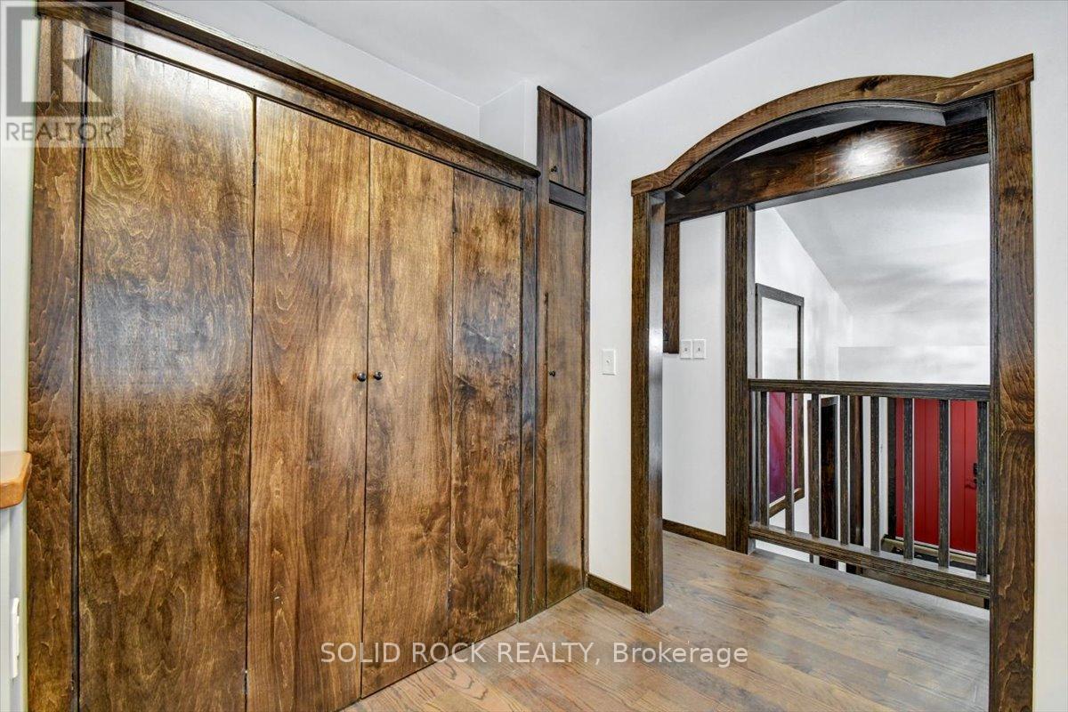 Closet doors open to laundry hookup - 132 Beaver Creek Road, Marmora And Lake (Marmora Ward), ON - Indoor Photo Showing Other Room