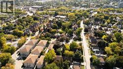 Aerial view of property's location with a tree filled landscape -