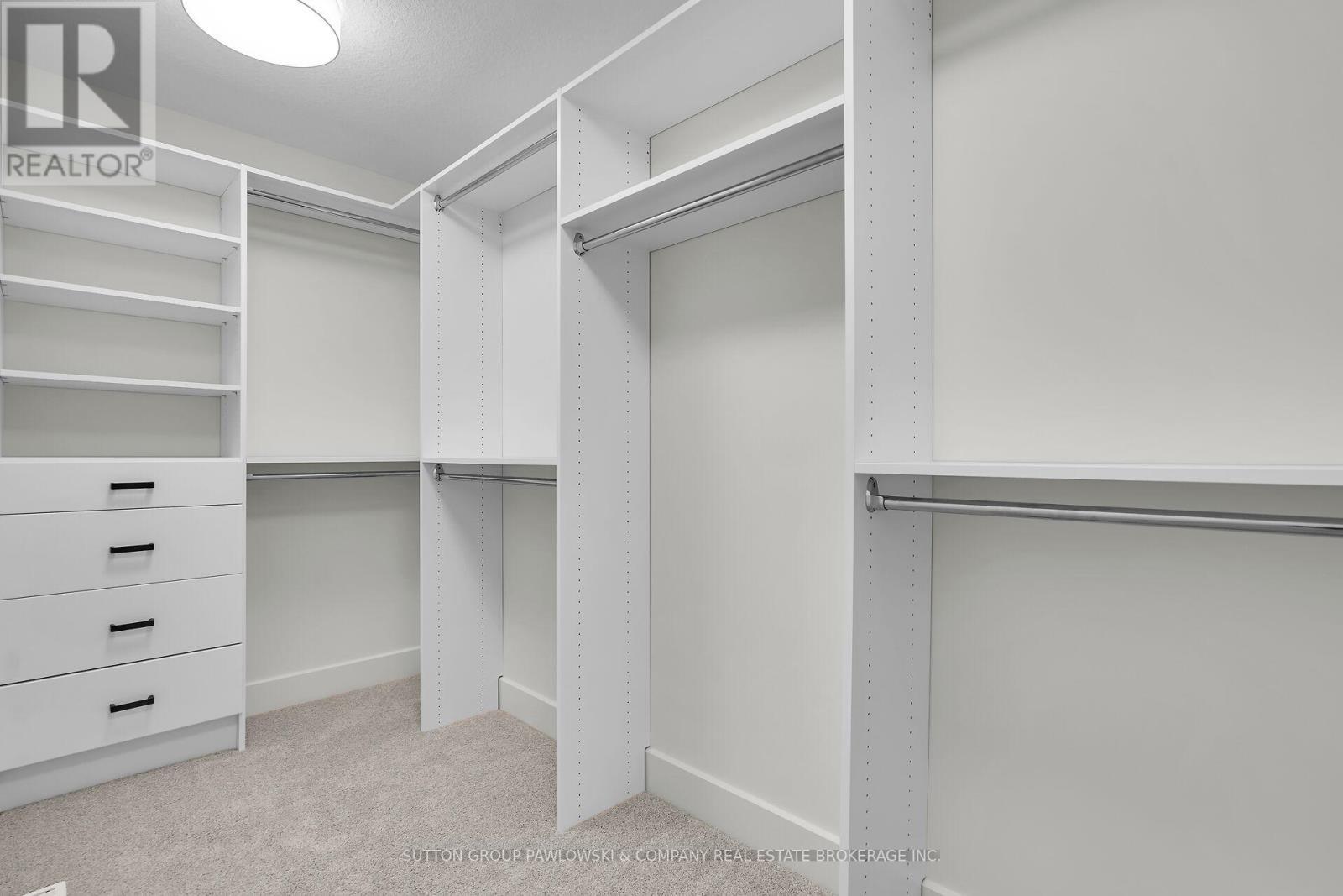 Photos are of model & show upgrades not included. - Lot #52 - 65 Arrowwood Path, Middlesex Centre (Ilderton), ON - Indoor With Storage