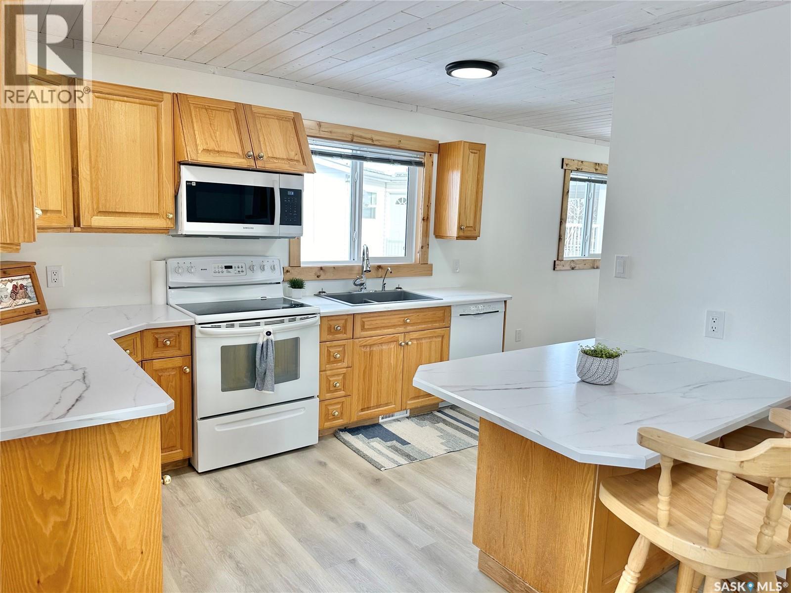 3 Morrow Place, Shell Lake, SK - Indoor Photo Showing Kitchen With Double Sink