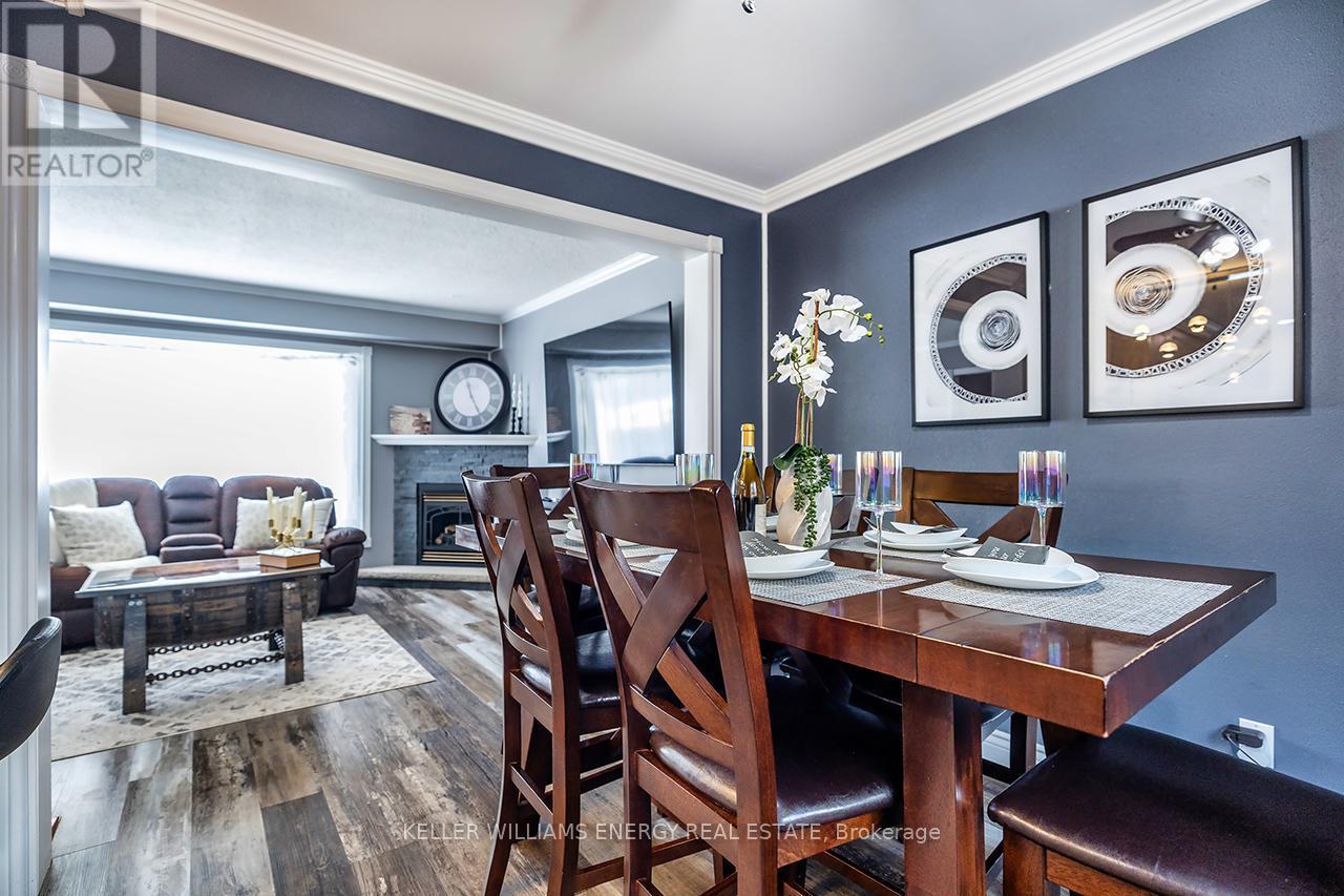 Open concept - 416 Mayfair Avenue, Oshawa (Centennial), ON - Indoor Photo Showing Dining Room With Fireplace