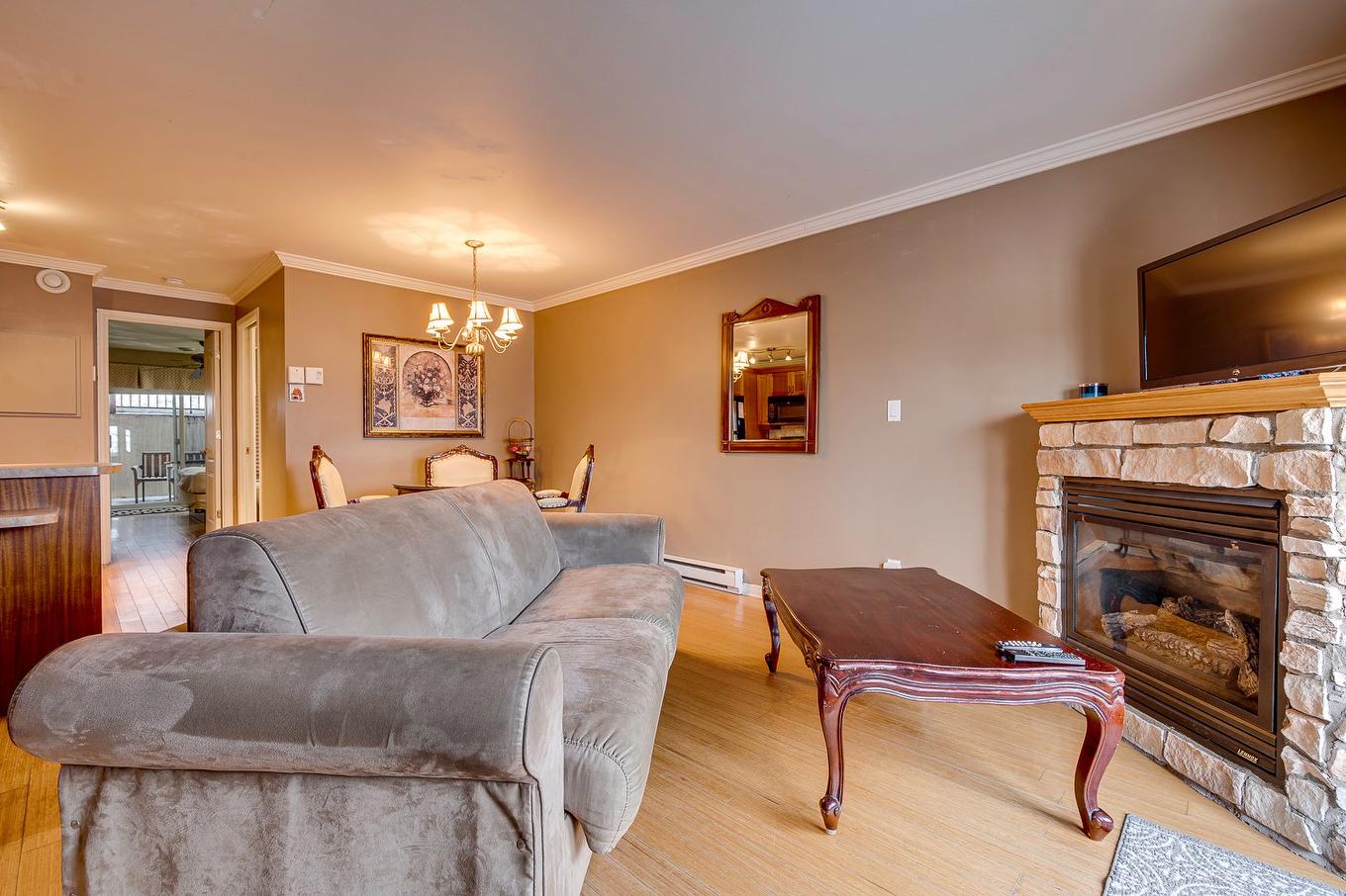 Living room - 3106-570 Ch. Des Frênes, Piedmont, QC - Indoor Photo Showing Living Room With Fireplace