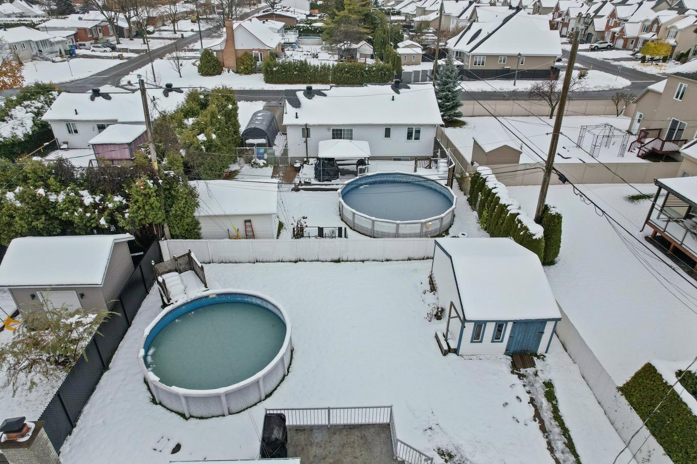 Aerial photo - 691 Rue De Lorraine, Mercier, QC - Outdoor With Above Ground Pool