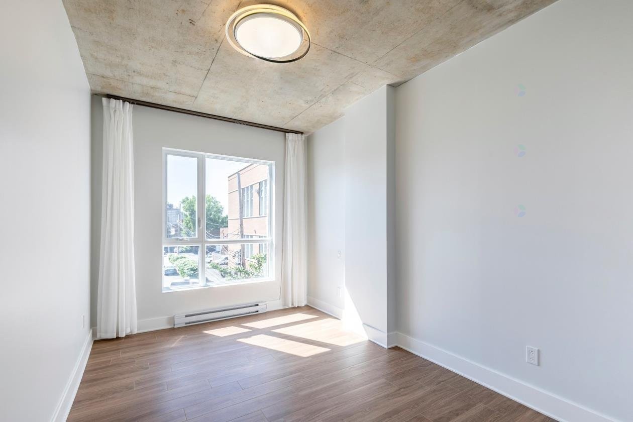 Chambre à coucher - 307-850 Rue Ouimet, Montréal (Saint-Laurent), QC - Indoor Photo Showing Other Room