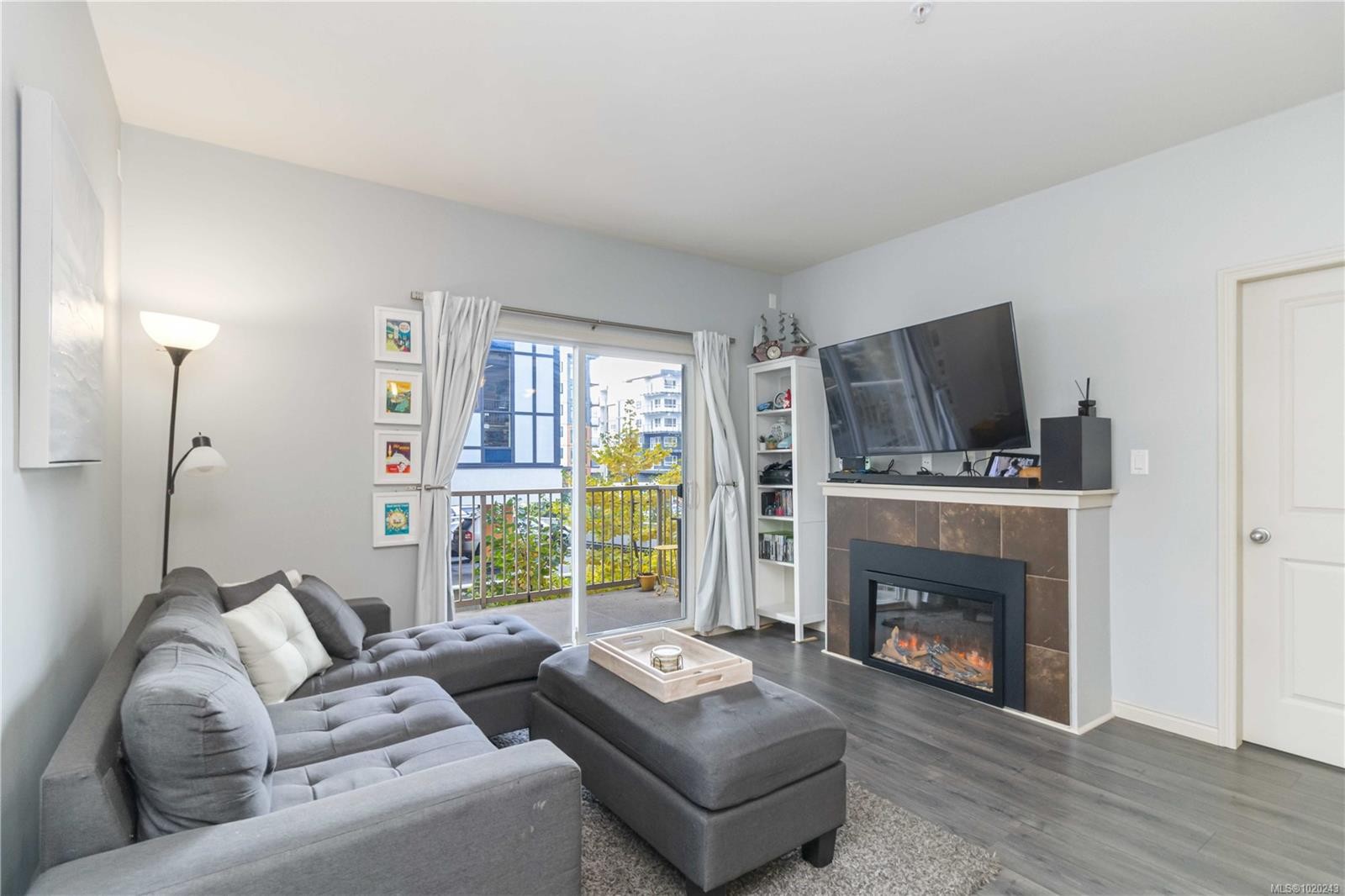 201-821 Goldstream Ave, Langford, BC - Indoor Photo Showing Living Room With Fireplace