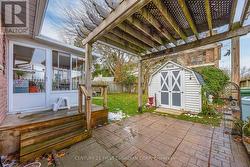 Garden Shed. Electric Lawnmower Included -