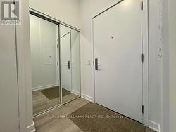 Front Foyer has double sliding mirror closet -