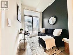 Living room has laminate flooring -