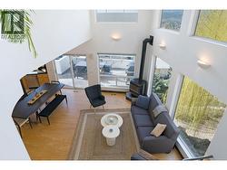 Open concept view rom the top of the stairs on the top floor. -