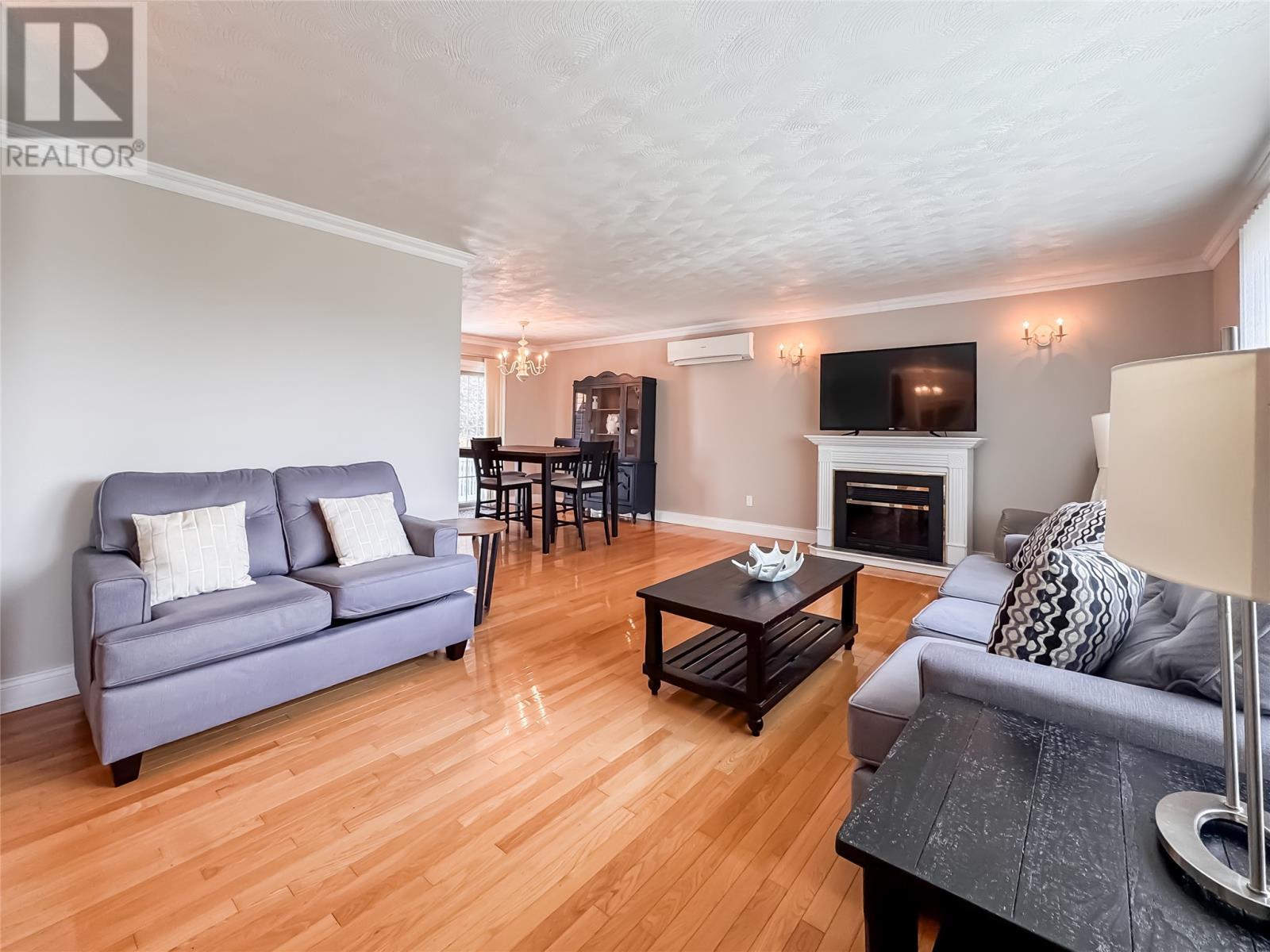 273 Main Street, Burin Bay Arm, NL - Indoor Photo Showing Living Room With Fireplace