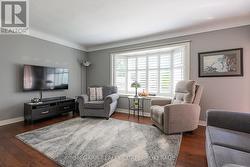 Large vinyl bay window with shutters -