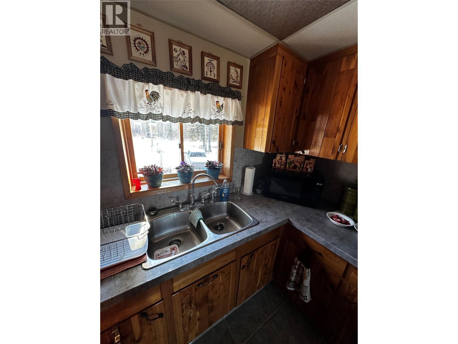 2959 Sawchuk Road, Chetwynd, BC - Indoor Photo Showing Kitchen With Double Sink
