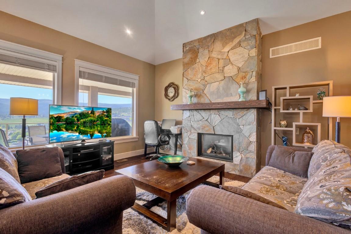 1205 Loseth Drive, Kelowna, BC - Indoor Photo Showing Living Room With Fireplace