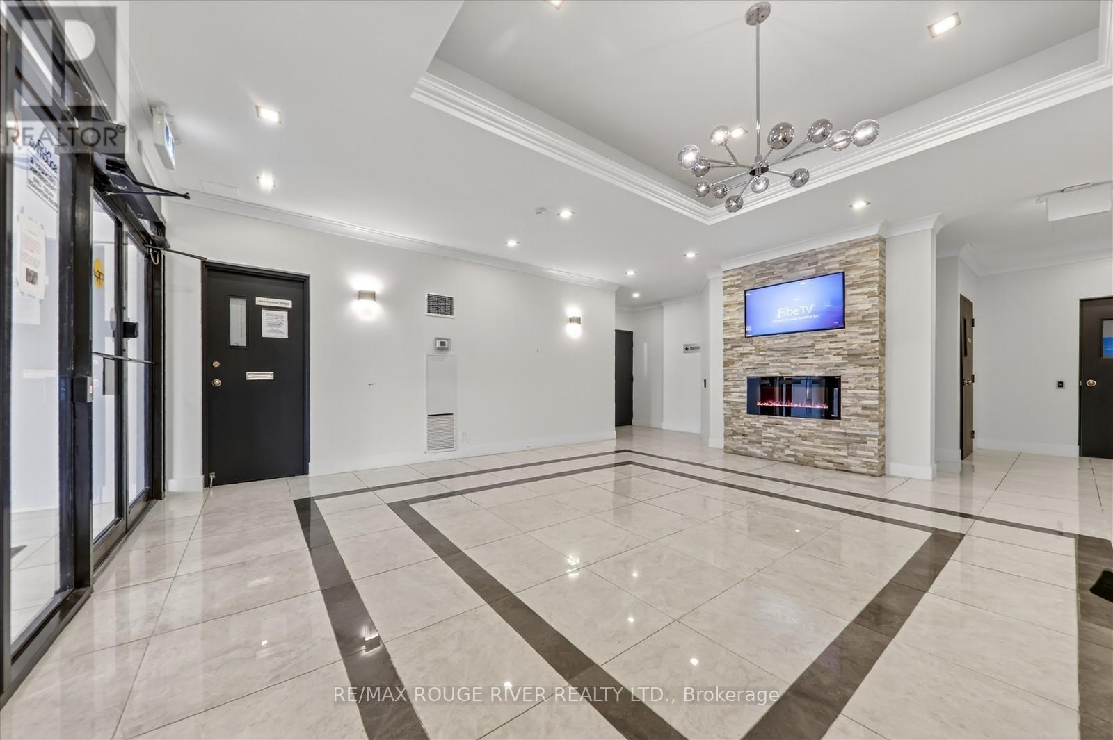 309 - 8 Silver Bell Grove, Toronto, ON - Indoor Photo Showing Other Room With Fireplace