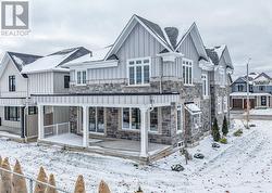 Covered loggia spans the back of the home -