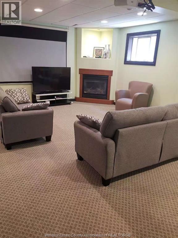 4662 Lavender Avenue, Windsor, ON - Indoor Photo Showing Basement With Fireplace