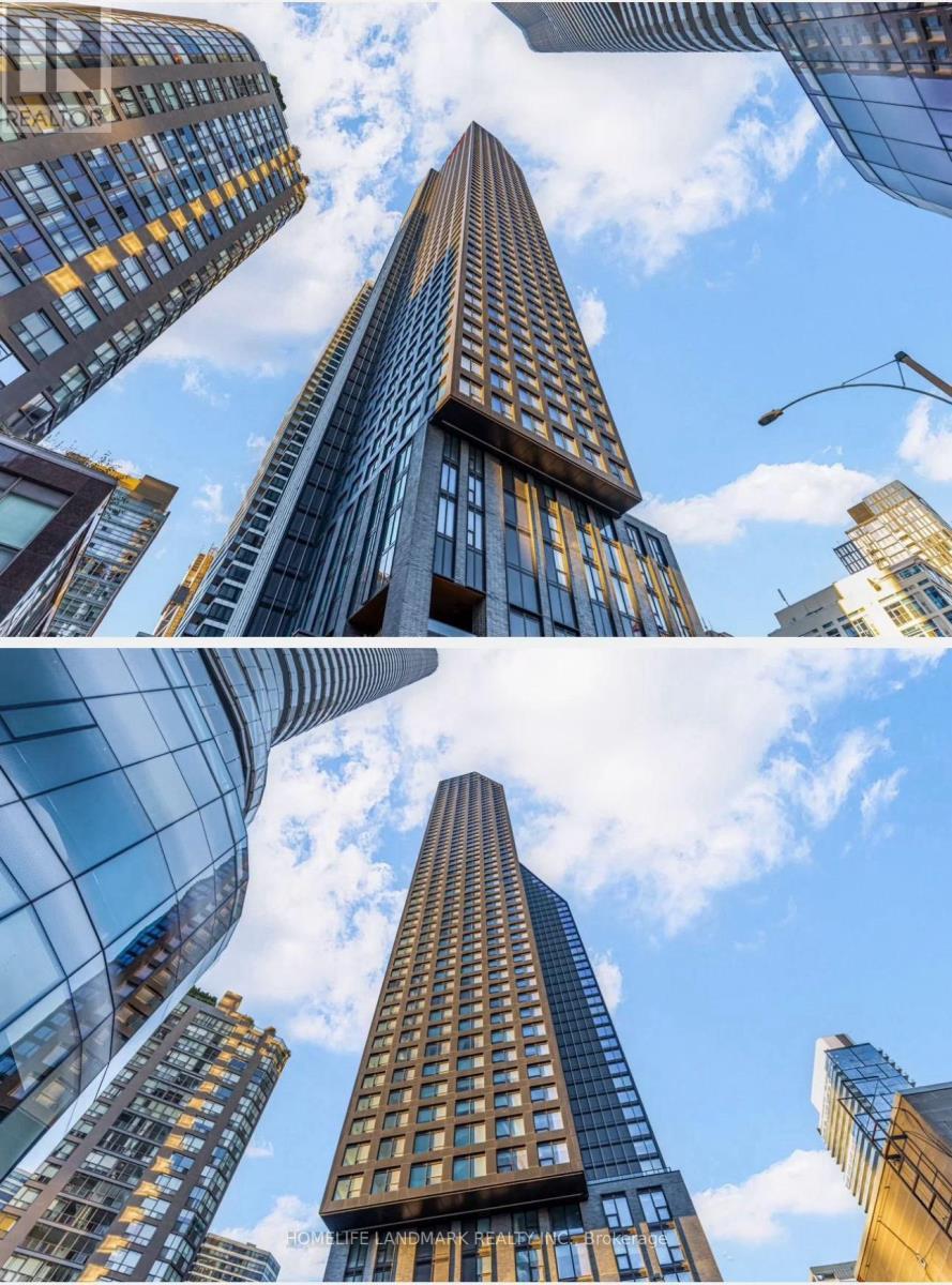 3916 - 8 Wellesley Street W, Toronto, ON - Outdoor With Facade