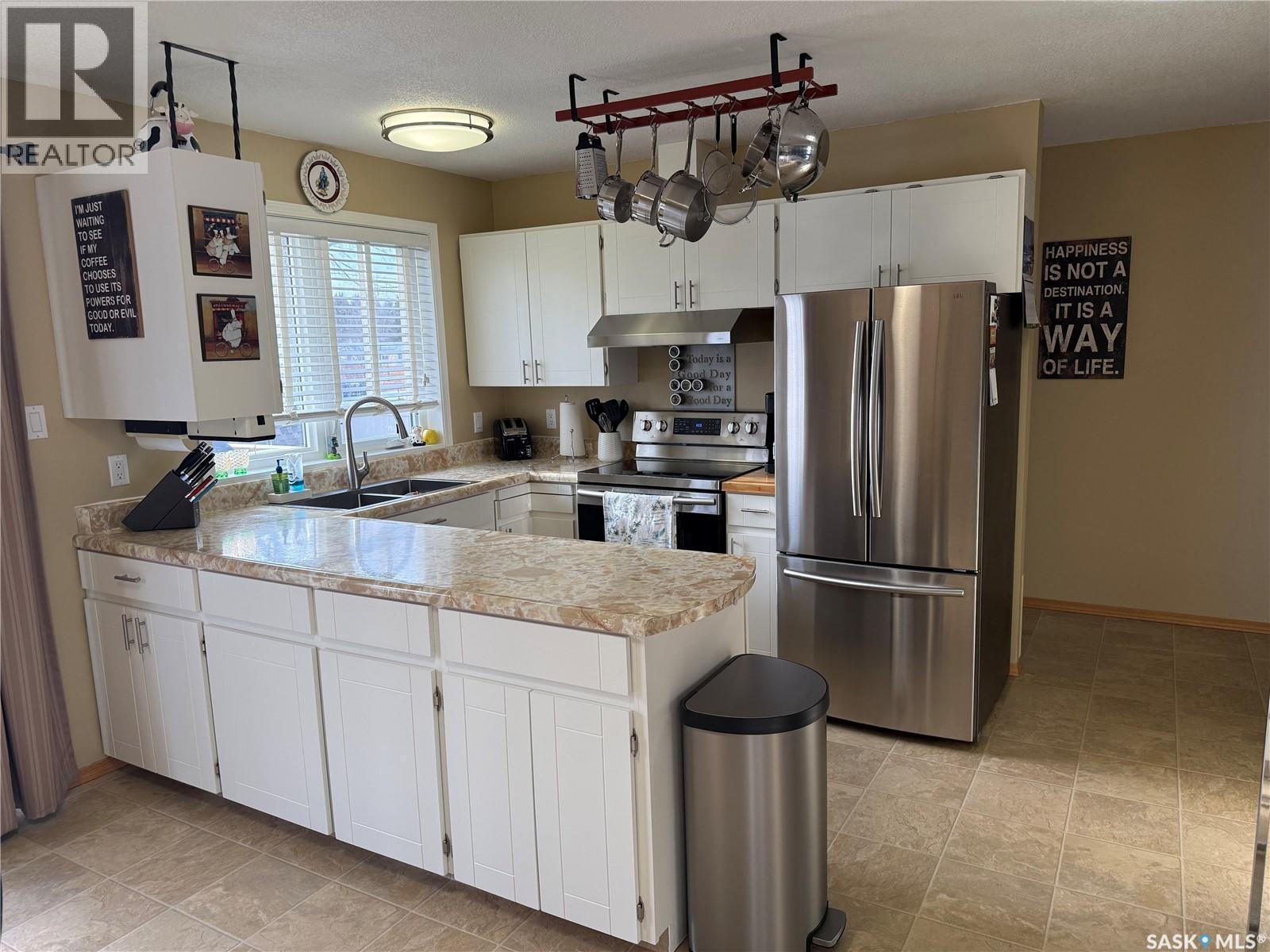 421 Logan Avenue, White Fox, SK - Indoor Photo Showing Kitchen With Double Sink