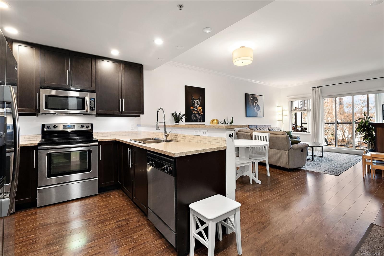 407-2881 Peatt Rd, Langford, BC - Indoor Photo Showing Kitchen With Stainless Steel Kitchen With Double Sink With Upgraded Kitchen