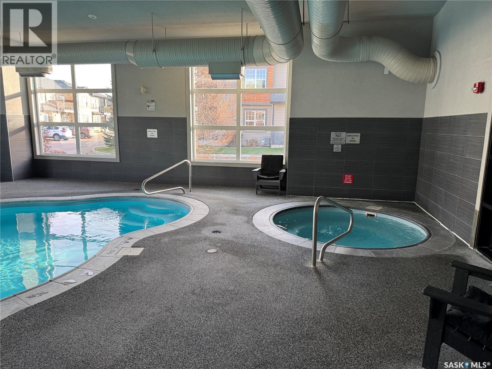 1206 1015 Patrick Crescent, Saskatoon, SK - Indoor Photo Showing Other Room With In Ground Pool