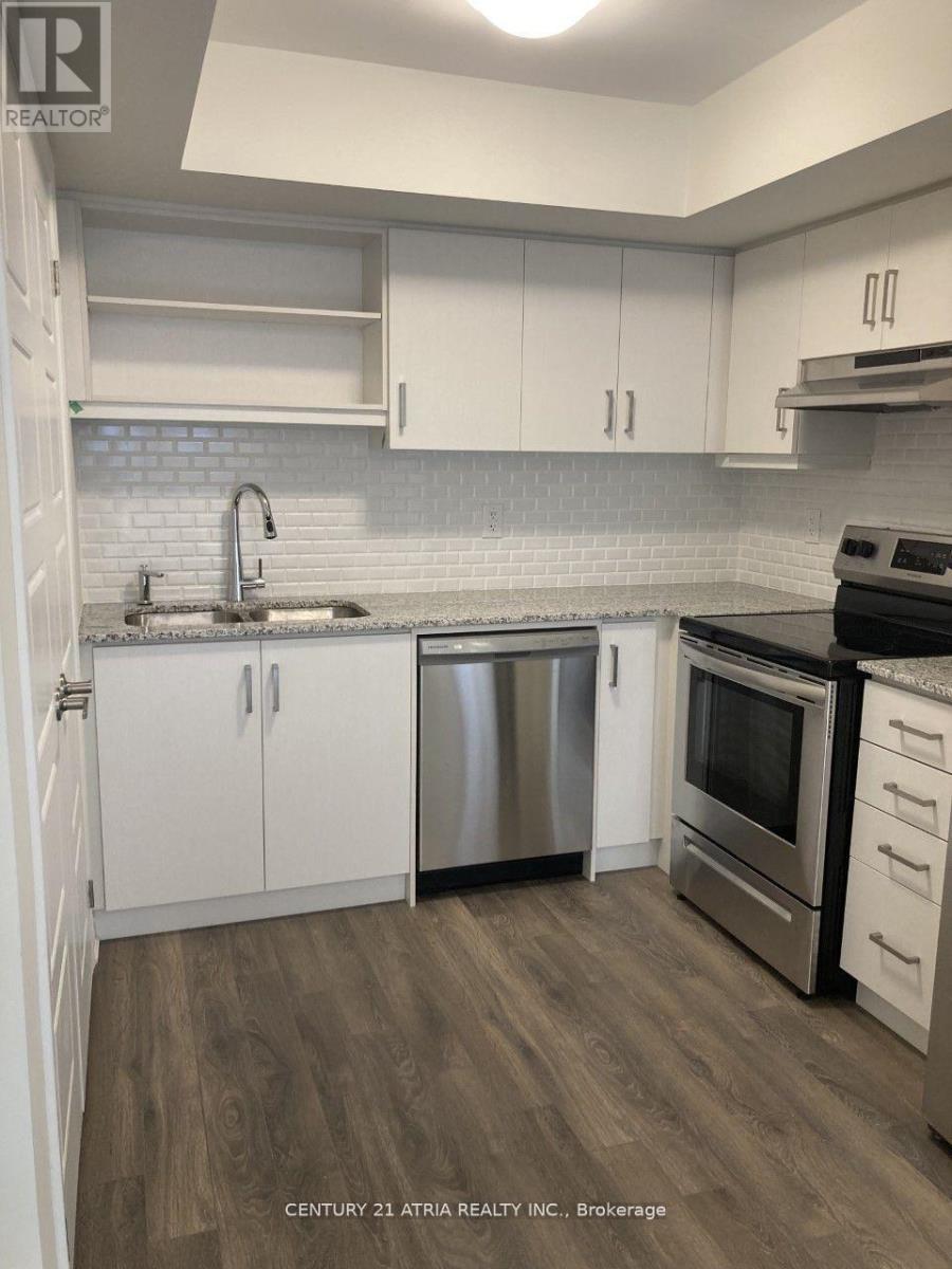 542 - 2791 Eglinton Avenue E, Toronto, ON - Indoor Photo Showing Kitchen With Double Sink