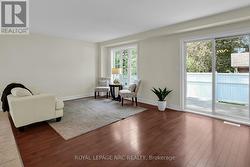 OPEN CONCEPT GREAT ROOM WITH SLIDING DOOR -